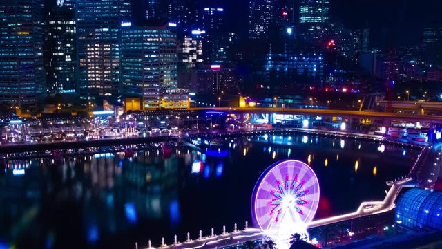 A night timelapse of bay area at Darling harbour in Sydney high angle wide shot