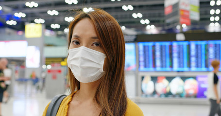 Asian Woman wear medical mask at airport