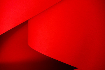 Designer red paper. Copy space on monochrome paper
