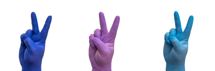 end of quarantine, pandemic of the coronavirus. hand with medical glove doing the Victory gesture