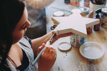 master class on creativity. girl makes a frame