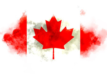 Canada flag performed from color smoke on the white background. Abstract symbol.