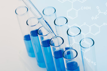 A pipette that adds fluid to one of several tubes. Lab tests