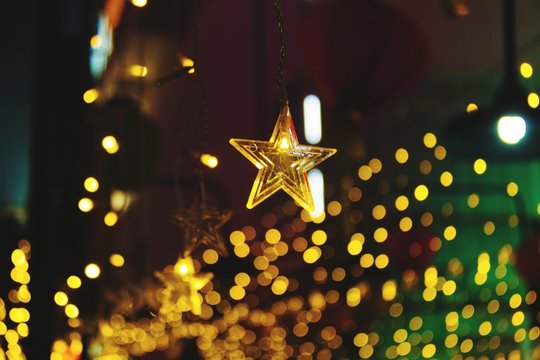 Close-up Of Gold Colored Star Shape Ornament