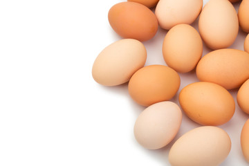 a lot of chicken eggs on a white background