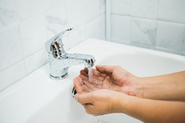 Close up Male hands washing hands with soap. for corona virus prevention.