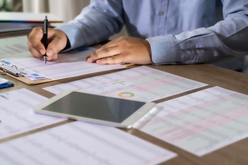 businessman working using a calculator finance accounting concept achievement to balance man assistant accounting.