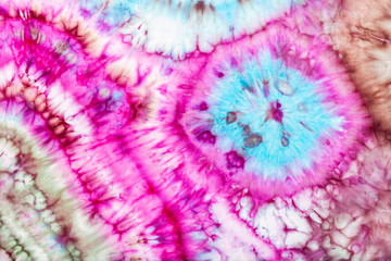 part of abstract bright pattern in tie-dye batik