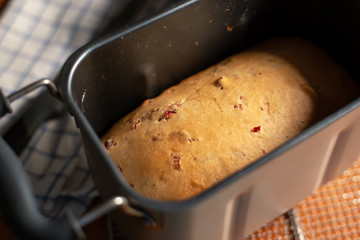 Baked bread in bread machine loaf pan