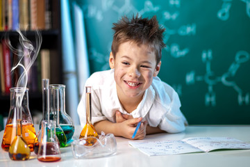 Boy in chemistry lesson