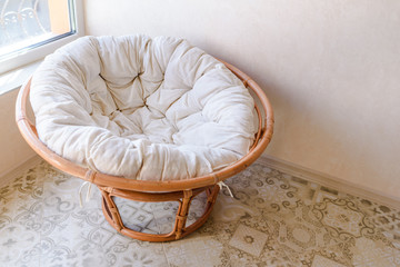 Fototapeta na wymiar Cozy and comfortable round chair. Home interior furniture.