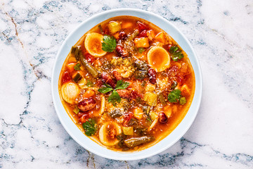 Minestrone, italian vegetable soup with pasta and beans.