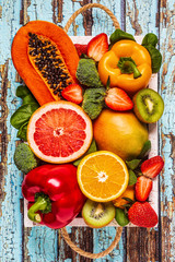 Fruits and vegetables rich in vitamin C in box. Healthy eating.