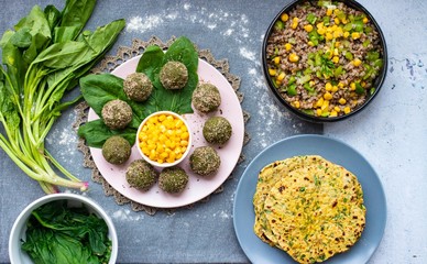 Pkhali - green vegetables peas, chickpeas beans balls. Cold snack with herbs, seeds and nuts. Vegan food