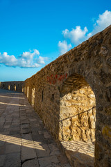 the mountain brick fortress in shadow and light