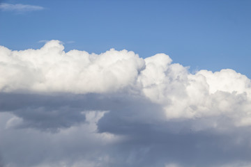Cloud in the blue sky. A beautiful clouds against the blue sky background. Beautiful cloud pattern in the sky.
