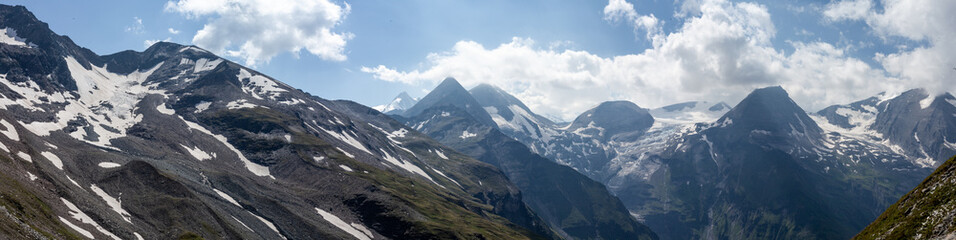 panorama of the Austrian alps in summer. a touch of snow but beautiful views.