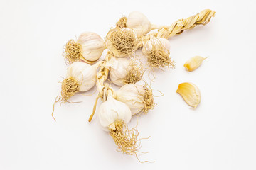 Ripe garlic heads isolated on white background