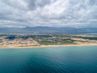 Naklejka premium Aerial view of Bai Dai beach at Cam Ranh Bay, owns spectacular landscape which has smooth white sand and clean blue sea. Bai Dai will become a key tourist site in the South of Khanh Hoa