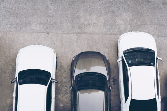 Parking lots. Aerial view. View from above of car parking full of vehicles. Copy space