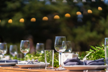 Preparing for an open-air party. Decorated served tables await guests. Decoration Details