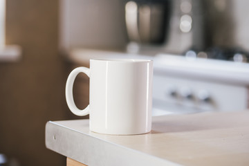 White cup of coffee on the table