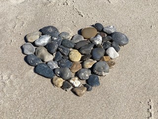 Fototapeta na wymiar stones in the sand