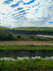 landscape with river and blue sky