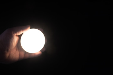 hand holding the moon