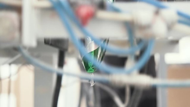 Packaging machine. Closeup. Production. Spice