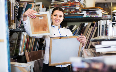Woman buying wall picture