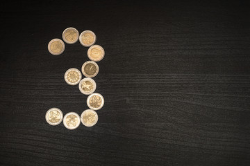 2 euro coins drawing a 3