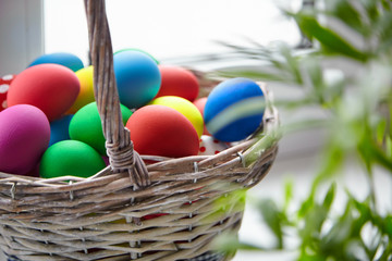 Easter Day, basket with colorful Easter Eggs