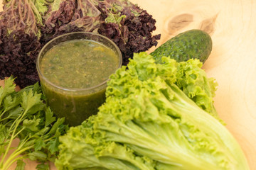 Green healthy smoothie. Salad in a glass. Watch your diet. Vegetarian preferences. Yummy.