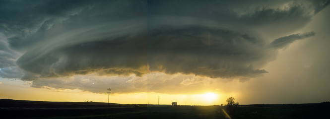 Rotating wall cloud of a supercell thunderstorm on the Great Plains. Composite of two scanned...