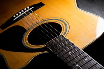 Obraz premium Acoustic guitar closeup