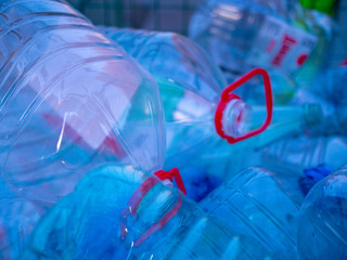 Pile of crumpled plastic bottles as background, closeup