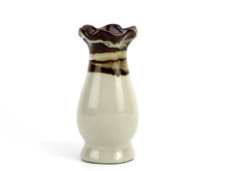 Vase for putting flowers on a brown top, white bottom isolated on white background.
