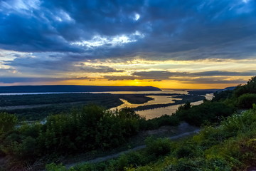 Fototapeta na wymiar Landscape with sunset on the river in summer
