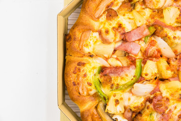 Closeup Pizza in a box Express delivery. The convenience of ordering food online.