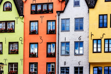 A row of colorful houses at the Rhine promenade in Cologne, Germany