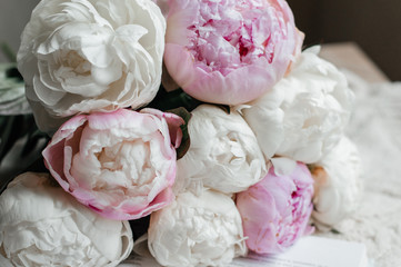 A beautiful bouquet of white and pink peonies