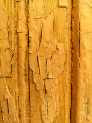 Cracked orange painted wall background