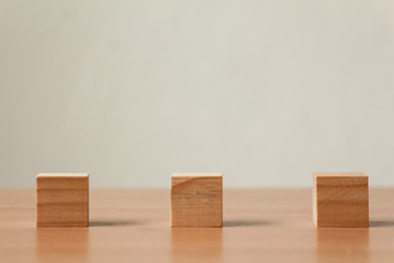 Wood cube on table. Social distance concept. 
