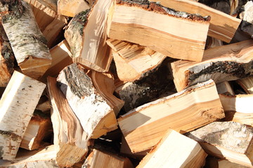 freshly split birch as firewood