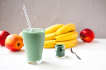 promotional shooting of a fruit cocktail for a healthy eating establishment. In the photo, a glass...