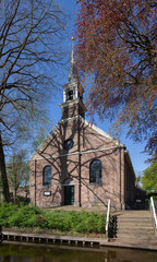 Giethoorn Overijssel Netherlands. During Corona lock-down. Empty streets, paths, bridges and canals. Church