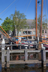 Fototapeta na wymiar Harbour Zwartsluis Overijssel Netherlands. Old ships. Barges. Bruine vloot.