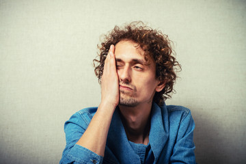 man was very tired at the office work