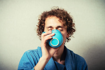 Fototapeta premium man with a cup